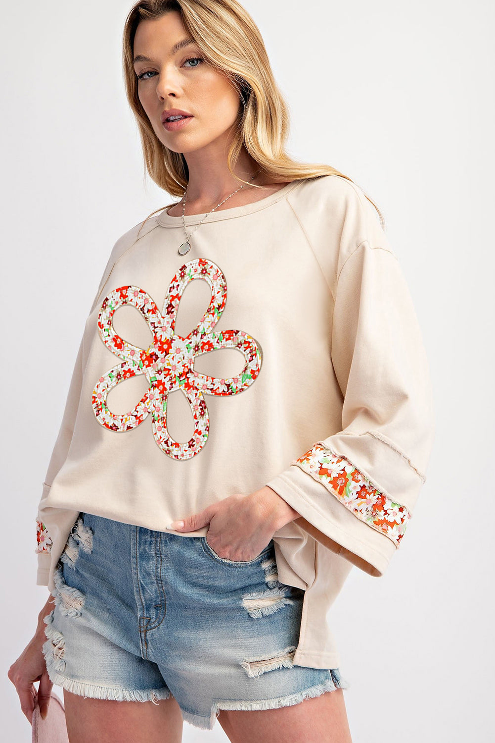 Flower Patch Graphic Exposed Seam Wide Sleeve Top