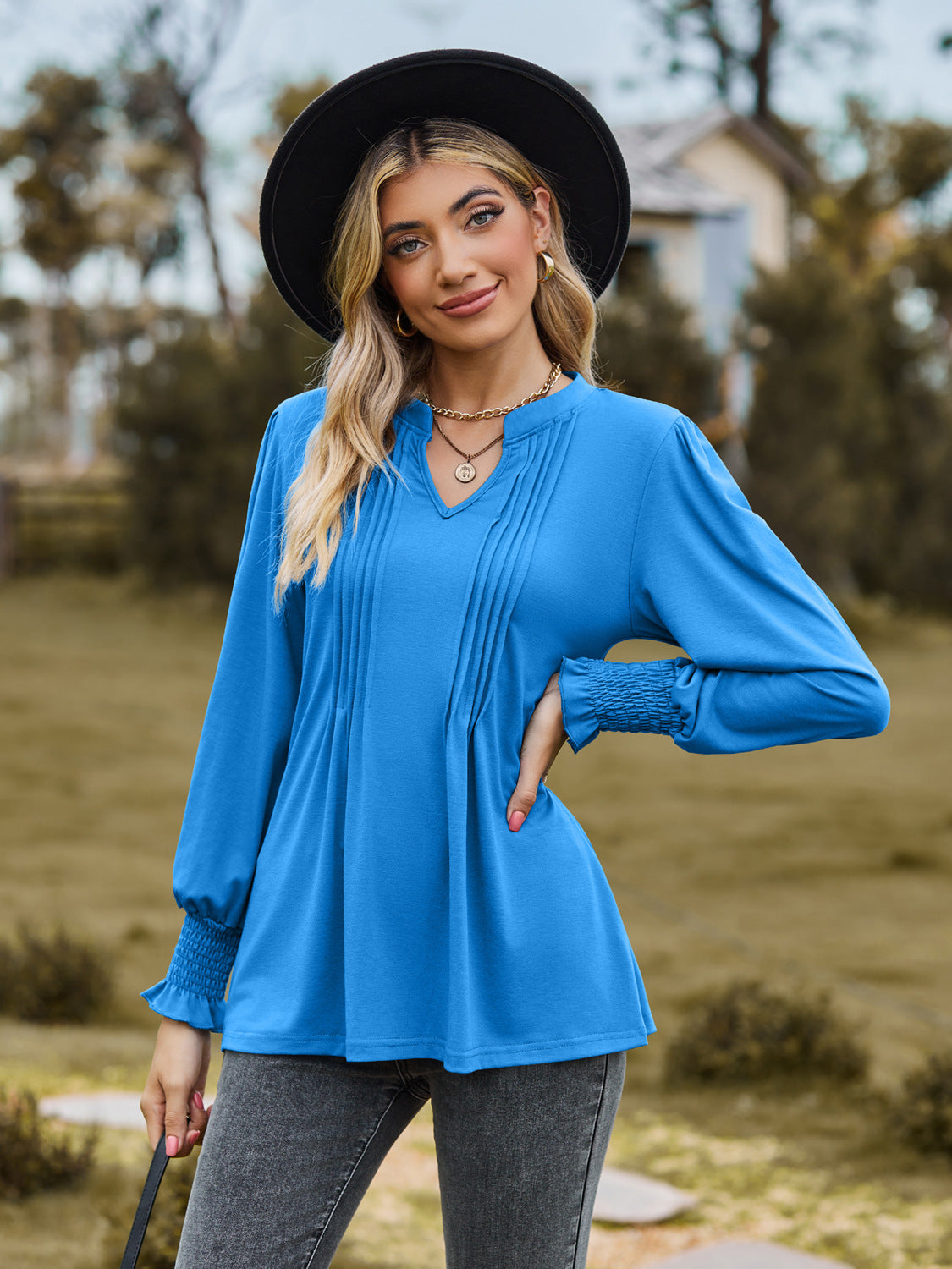 Women's Solid Color Pull-strip Bubble Sleeves V-neck Long-sleeved Top