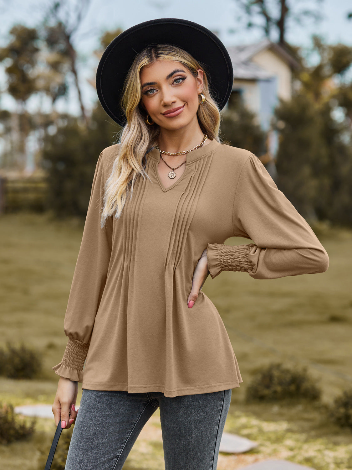 Women's Solid Color Pull-strip Bubble Sleeves V-neck Long-sleeved Top