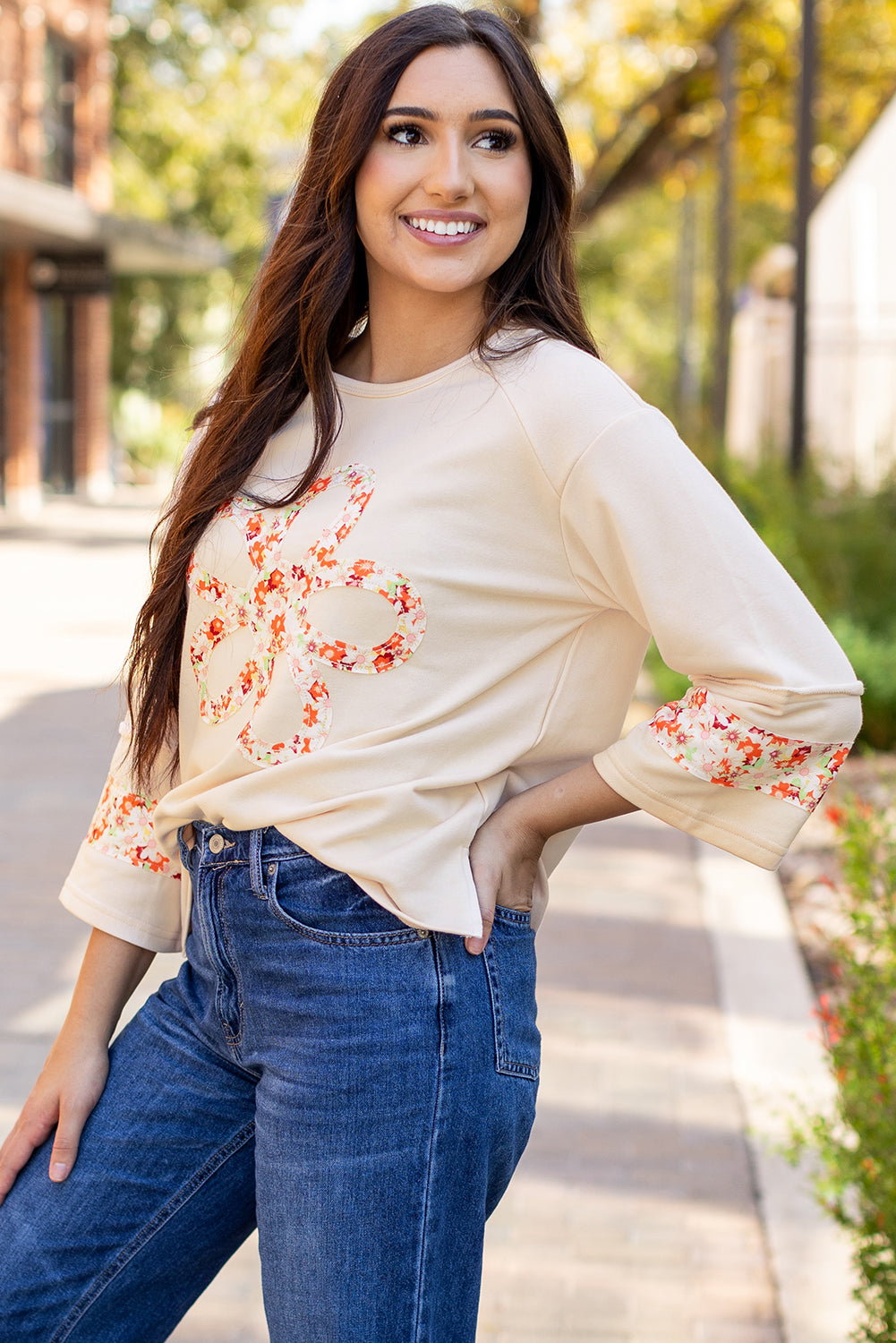 Flower Patch Graphic Exposed Seam Wide Sleeve Top