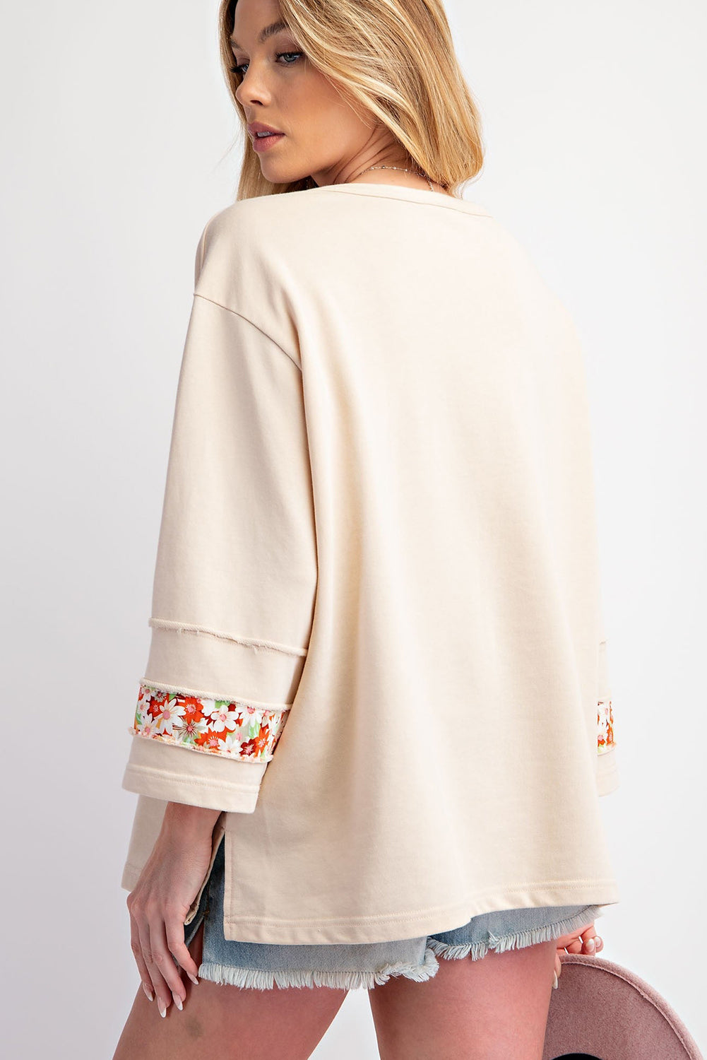 Flower Patch Graphic Exposed Seam Wide Sleeve Top