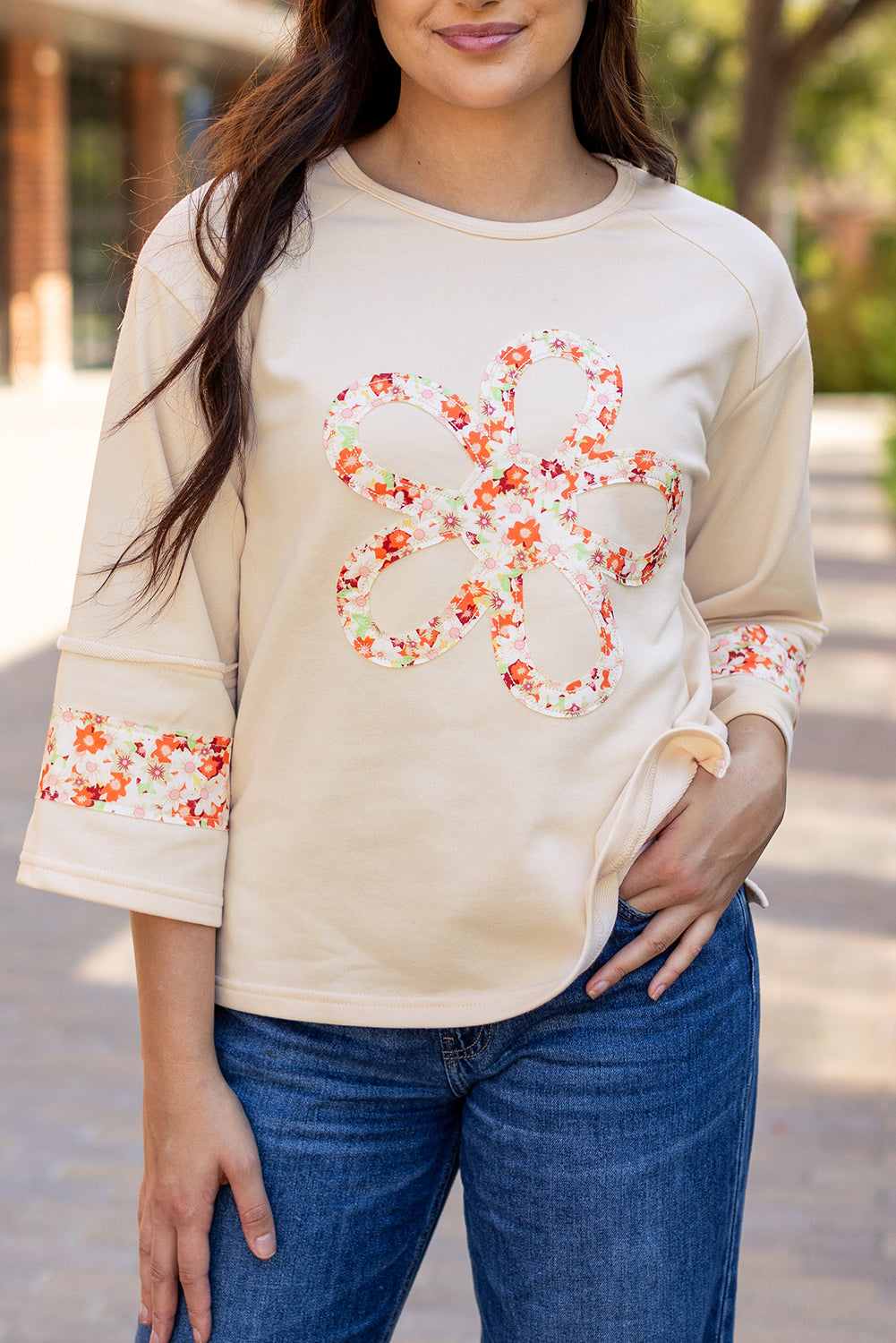 Flower Patch Graphic Exposed Seam Wide Sleeve Top